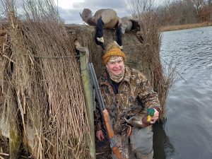 Waterfowl hunting. Ed in a duck blind